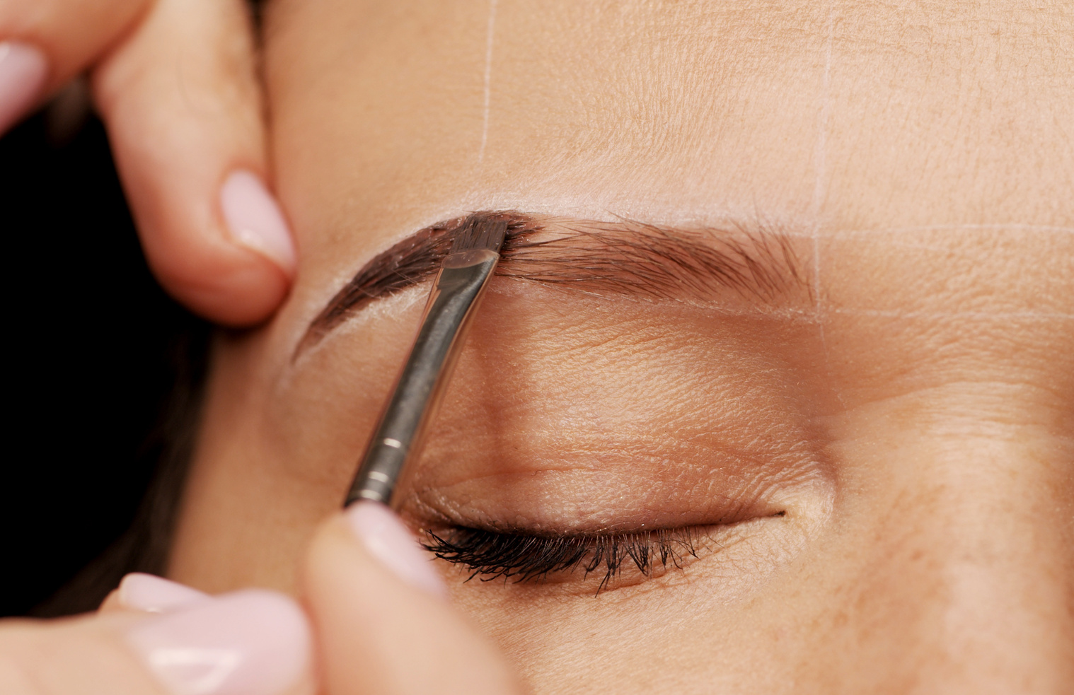 Woman Is  on the Eyebrow Coloring Procedure. Professional Lamina